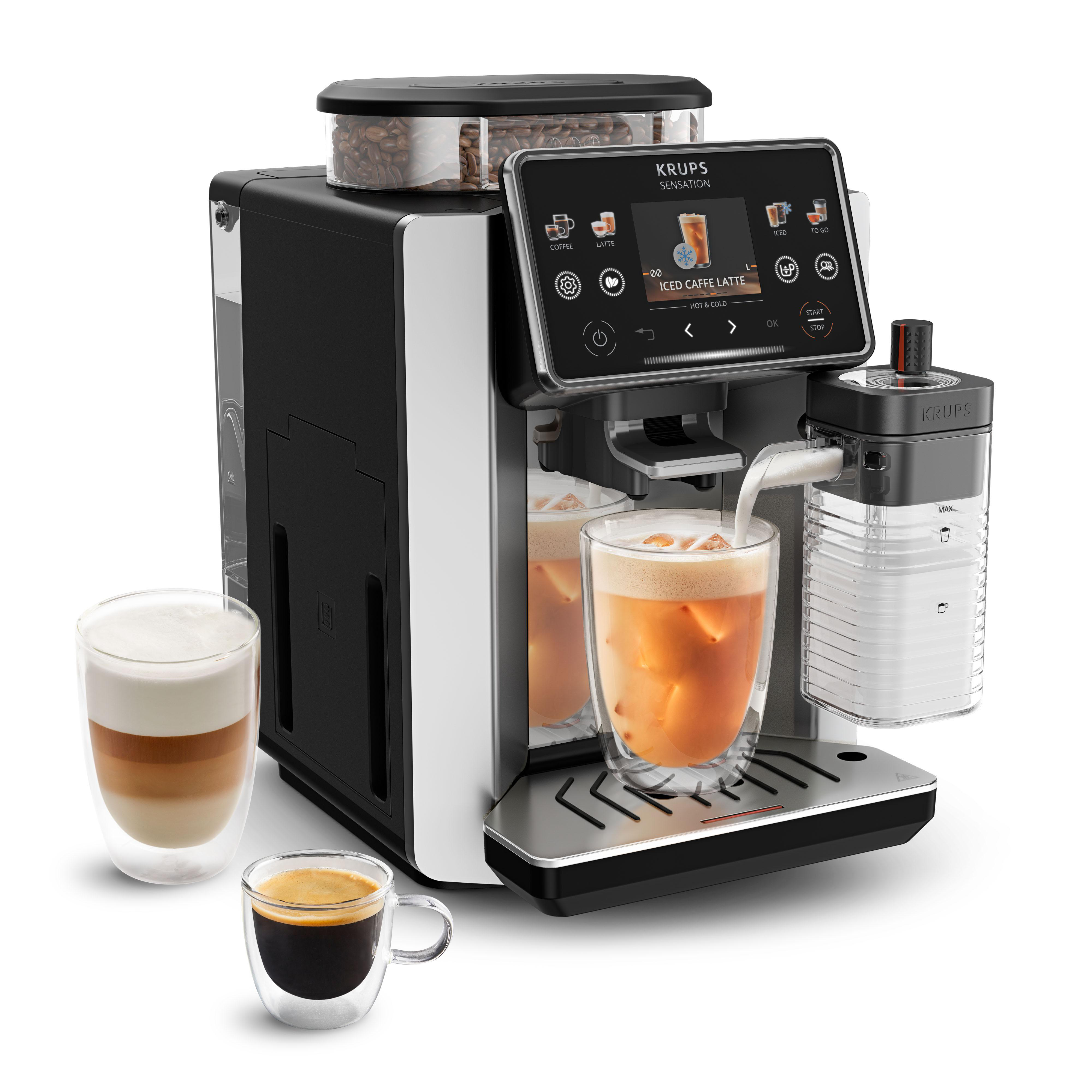 Krups Kaffeevollautomat mit Bohnenbehälter, Milchkaraffe und 3 Kaffees.