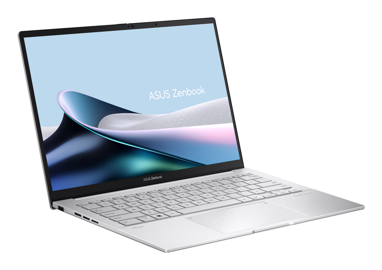 Un portátil plateado ASUS Zenbook con teclado retroiluminado, mostrado sobre fondo blanco.