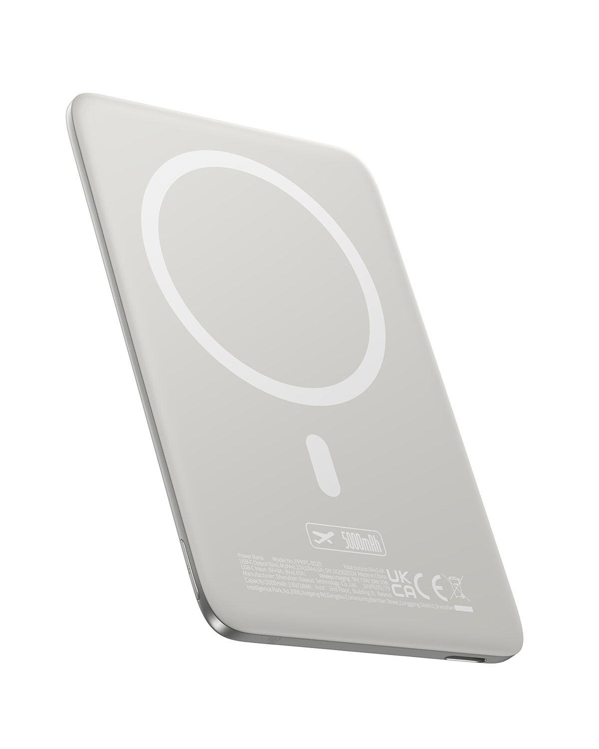 Un cargador portátil gris con superficie de carga magnética y capacidad de 5000mAh.