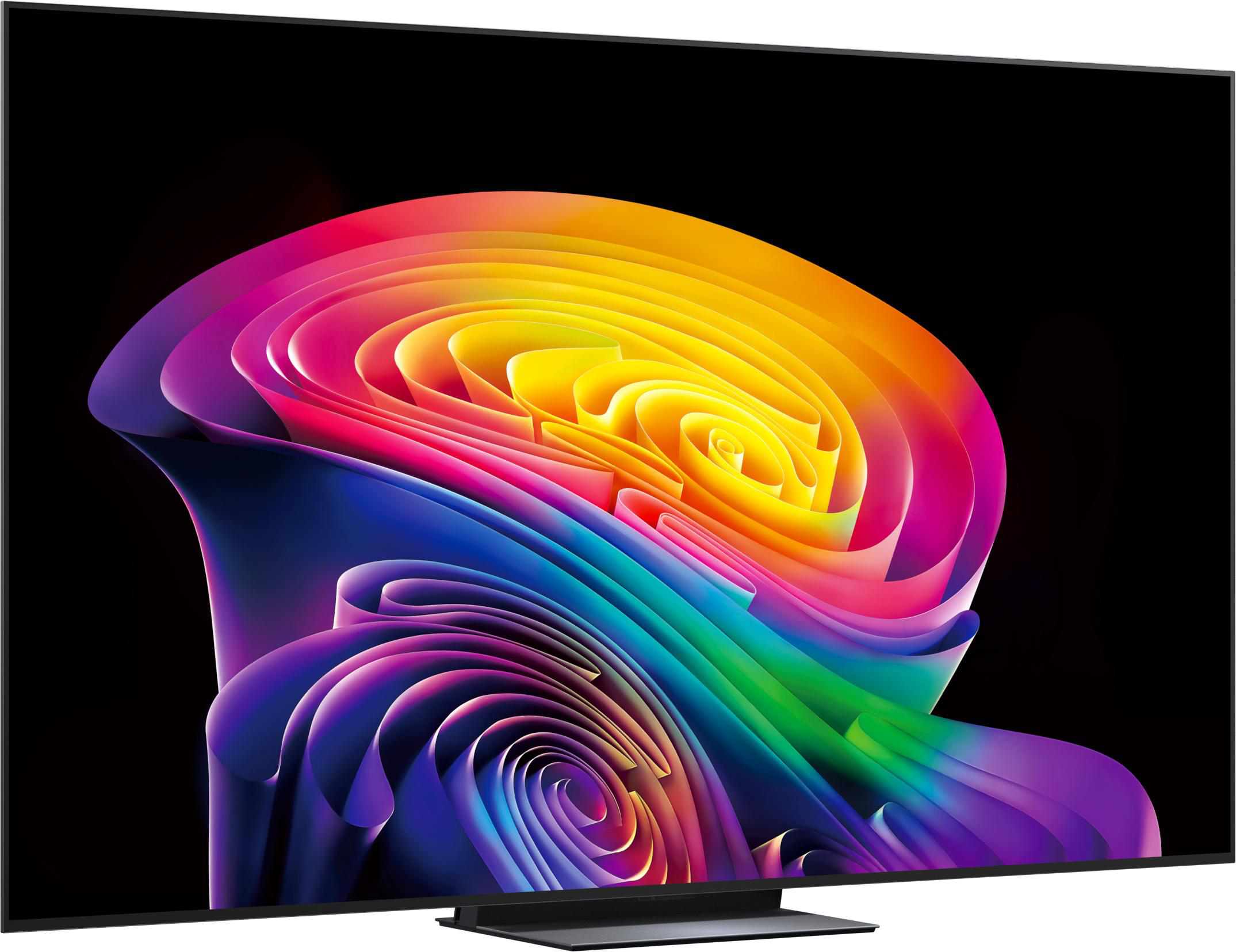 Ein Fernseher zeigt eine abstrakte, bunte 3D-Grafik mit Spiralen aus Farben.
