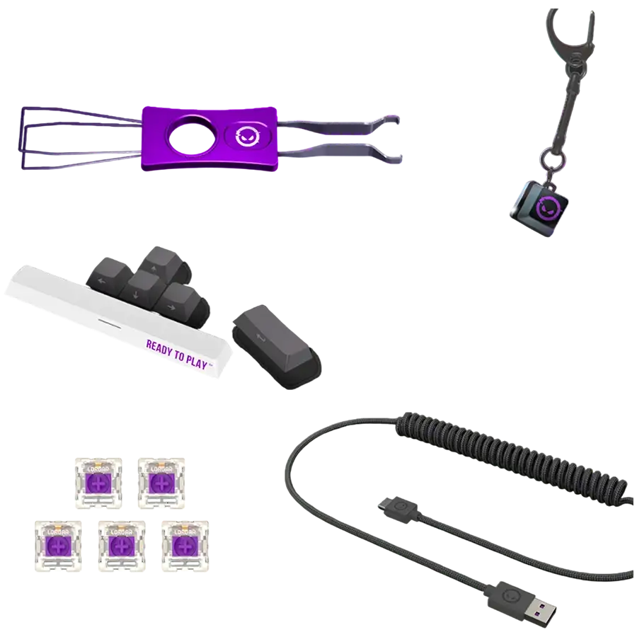 Lila billentyűsapkaki húzó, bűbáj, billentyűsapkák, szóköz és spirális USB kábel.