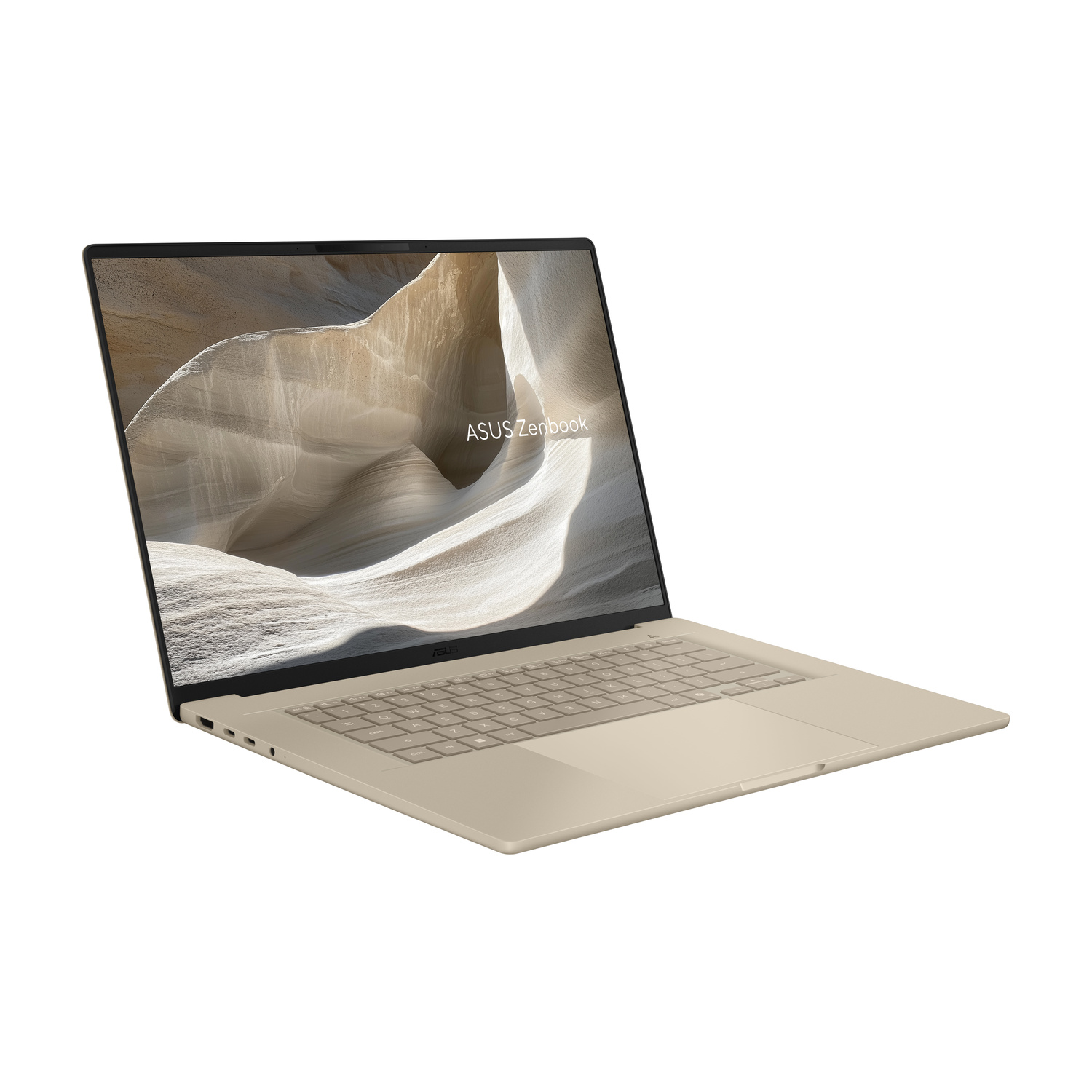 Un laptop aperto e chiaro con testo ASUS Zenbook sullo schermo.