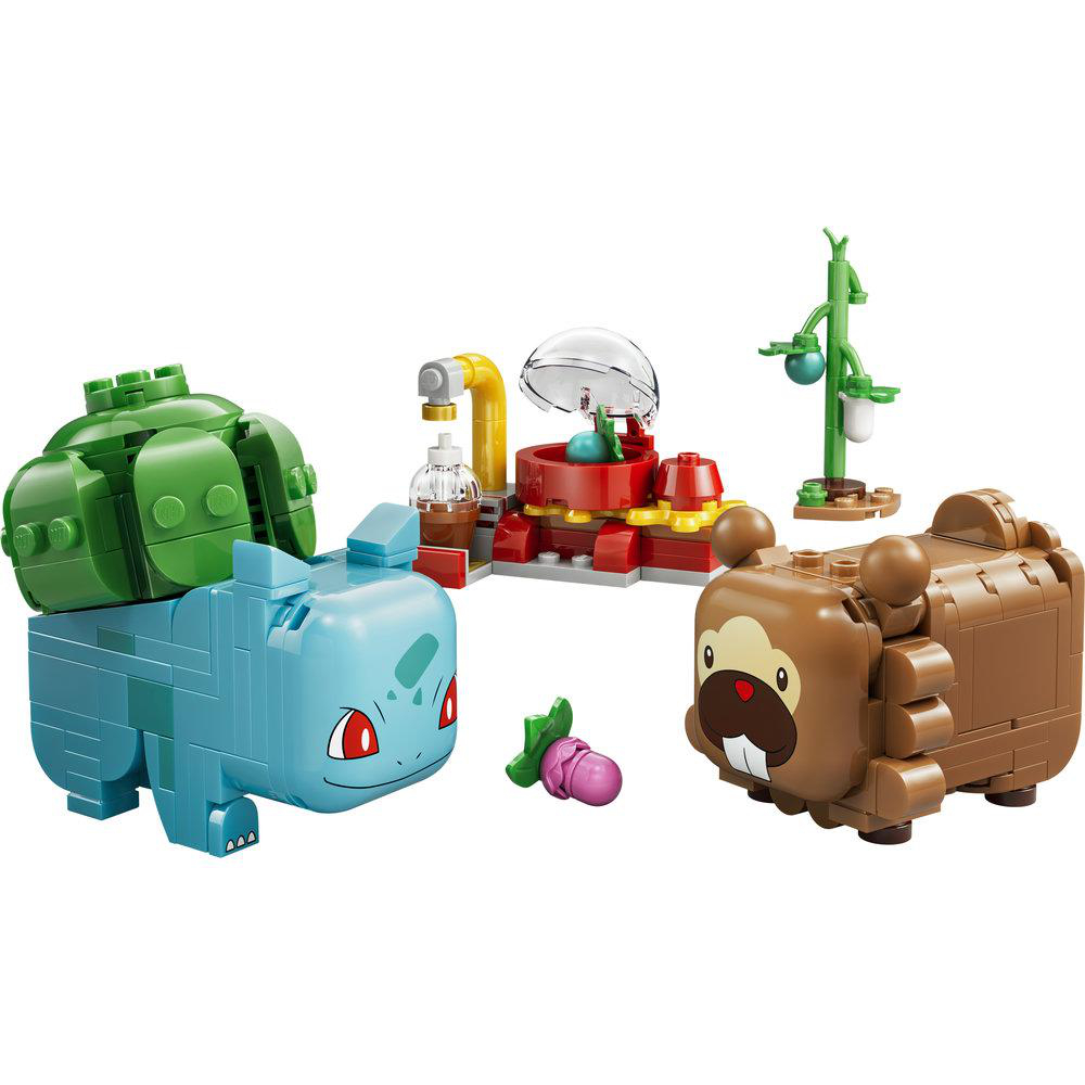 Blaues Pokémon, braunes Pokémon, rote und gelbe Struktur, grüne Pflanze, pinker Gegenstand.