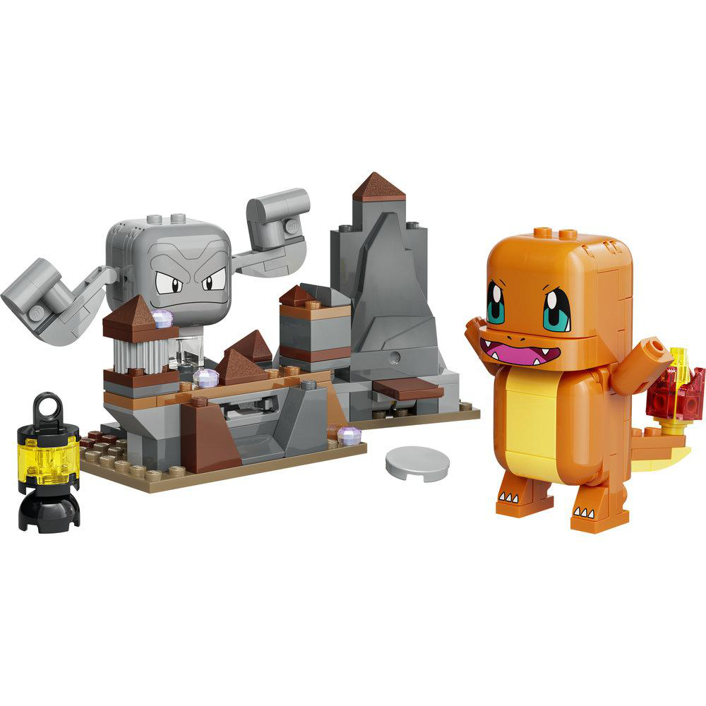 Ein LEGO-Charmander neben einem Felsen und einem Turm.