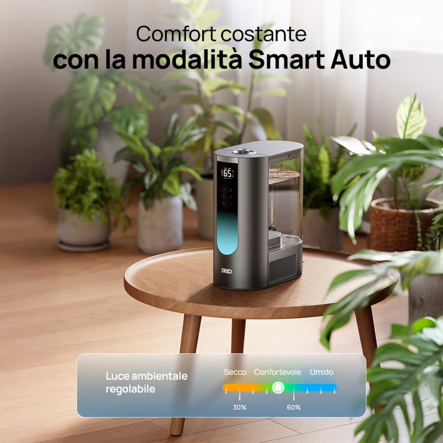 Umidificatore con display digitale su tavolo di legno, circondato da piante.