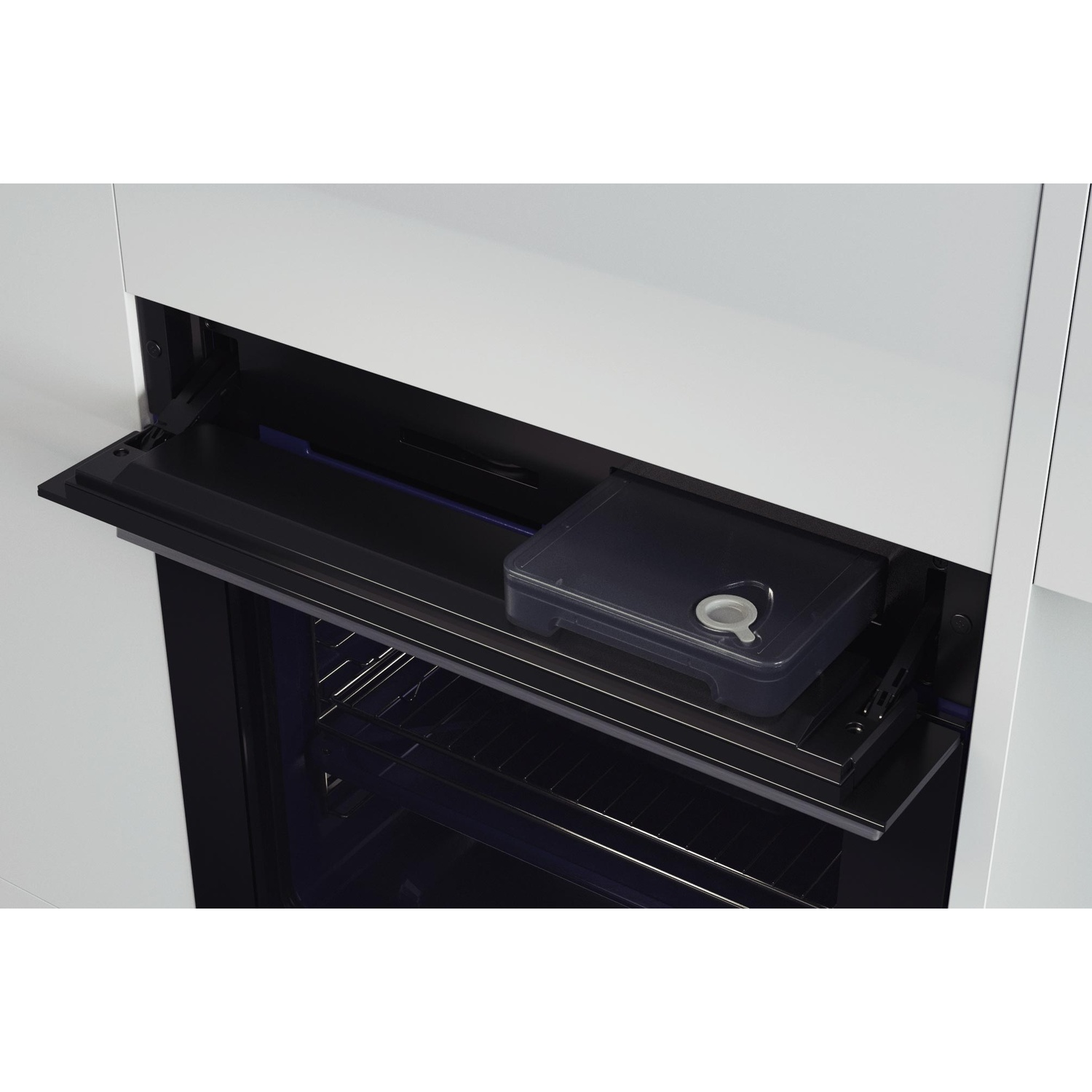 Un cassetto estraibile con serbatoio dell'acqua per un forno.