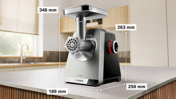 Bosch Fleischwolf mit Maßen: Höhe 348mm, Breite 263mm, Tiefe 258mm, Grundfläche 189mm.