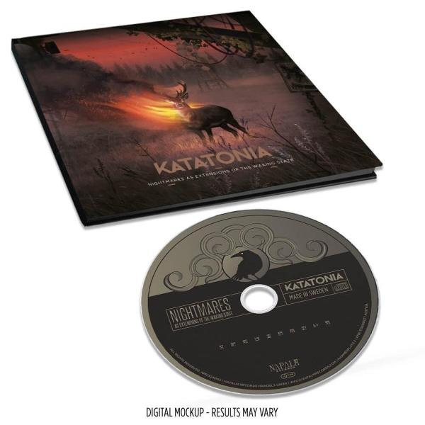 Ein Buchcover und eine CD mit einem Hirsch und brennendem Licht.