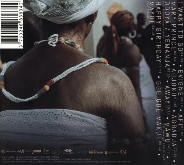Rückseite eines Albums mit Fokus auf die Schultern einer Frau mit Perlenkette.