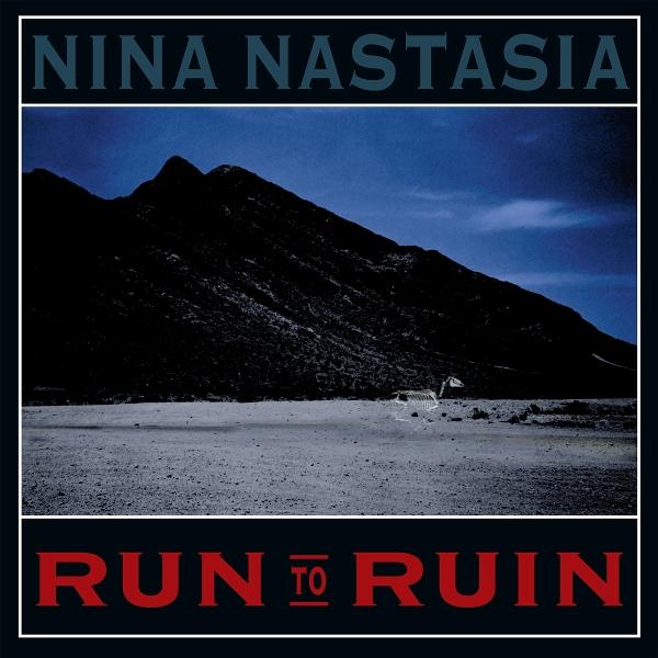 Albumcover: Nina Nastasia. Dunkler Berg, Skelettreste, blauer Himmel. Text: Run to Ruin.