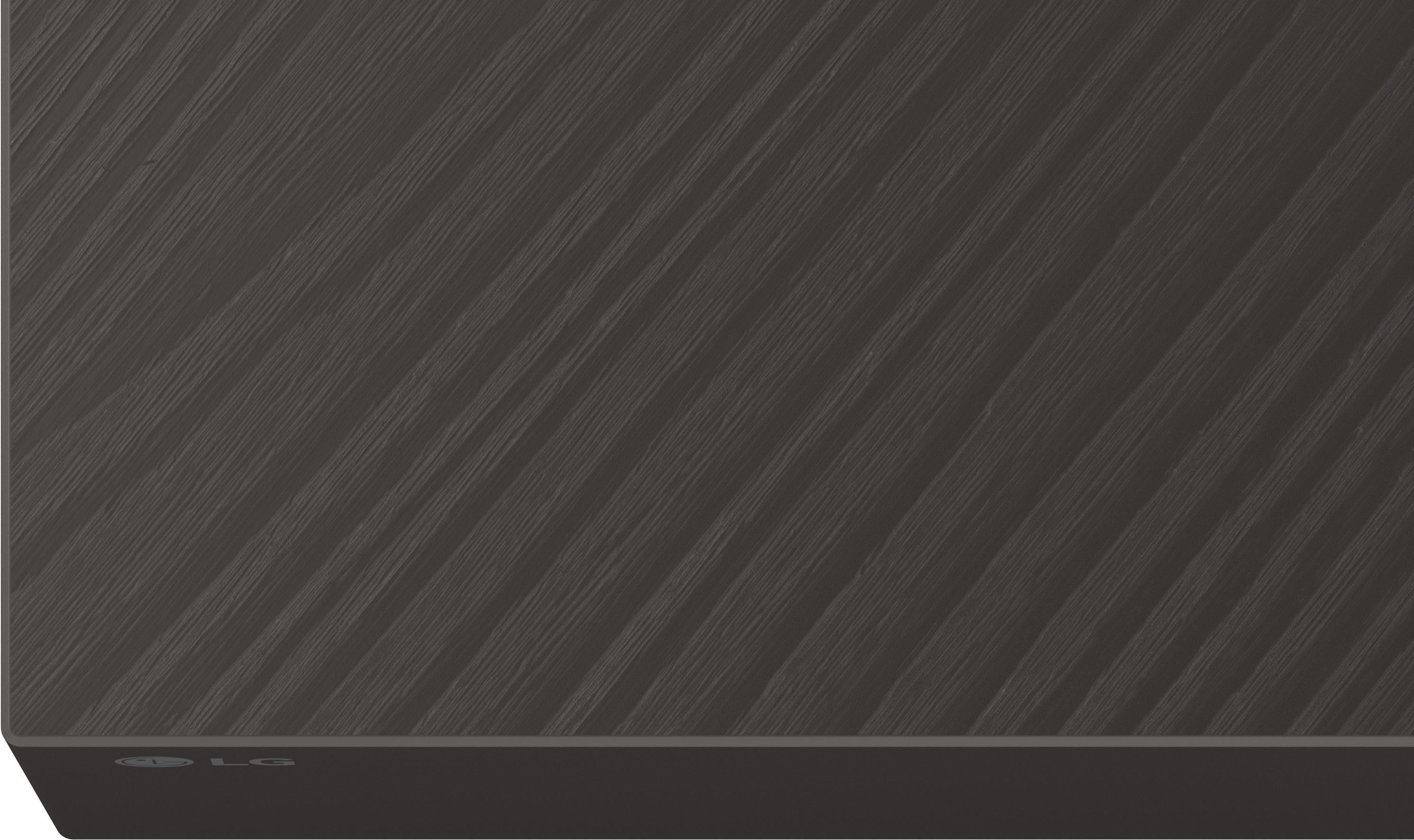 Graues LG-Gerät mit diagonaler Textur und polierter Unterseite.