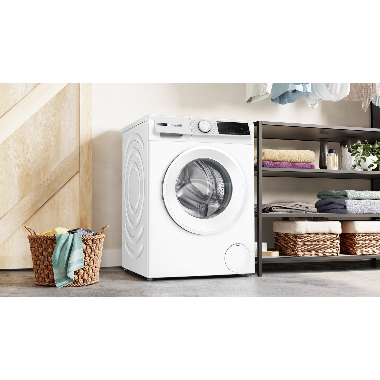 Machine à laver Bosch blanche avec panier à linge et étagères de serviettes.