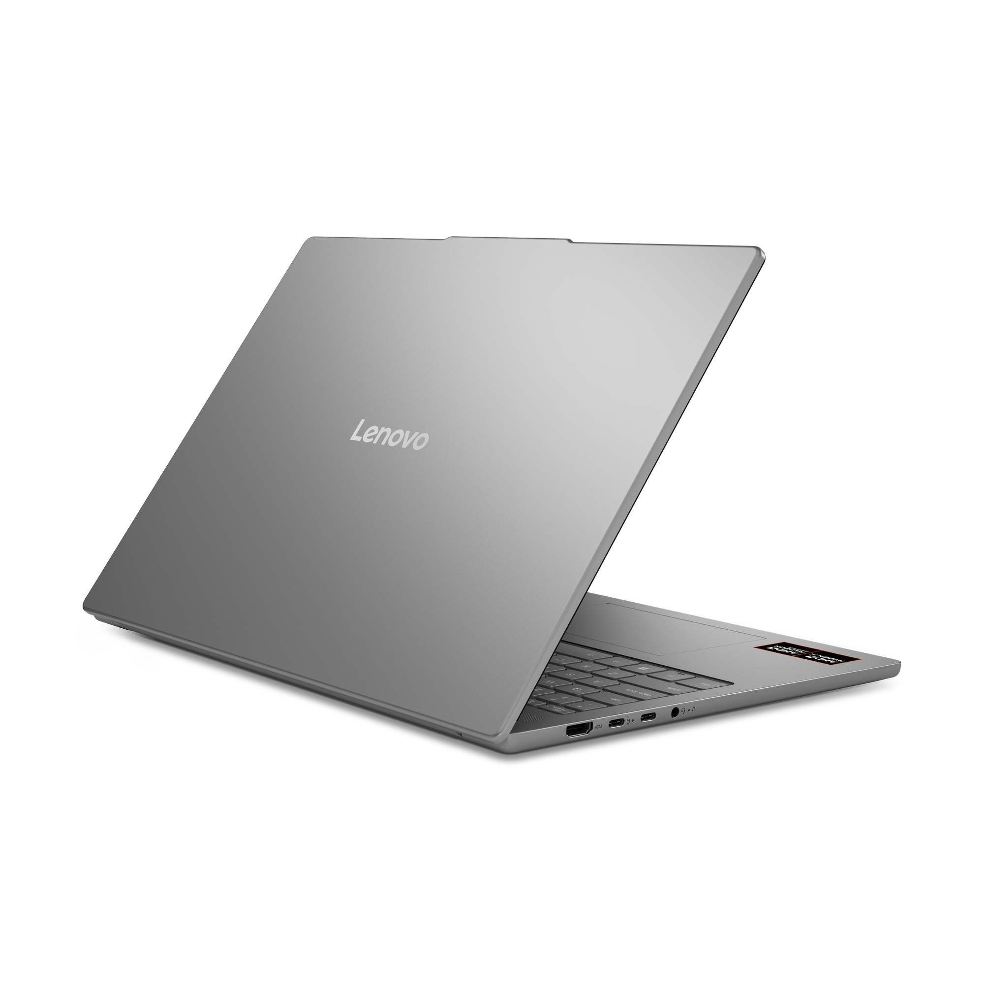 Ein silberner Lenovo Laptop ist geöffnet und auf schwarzem Hintergrund zu sehen.