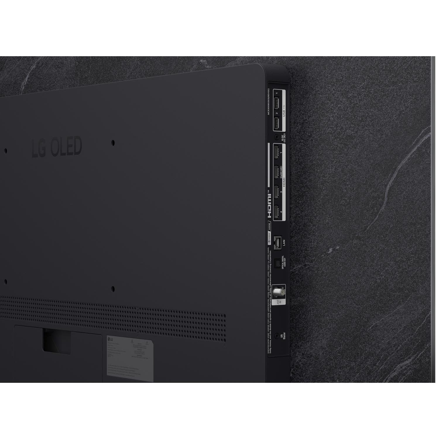 Achterkant van een zwarte LG OLED TV met poorten zoals HDMI, USB en LAN.