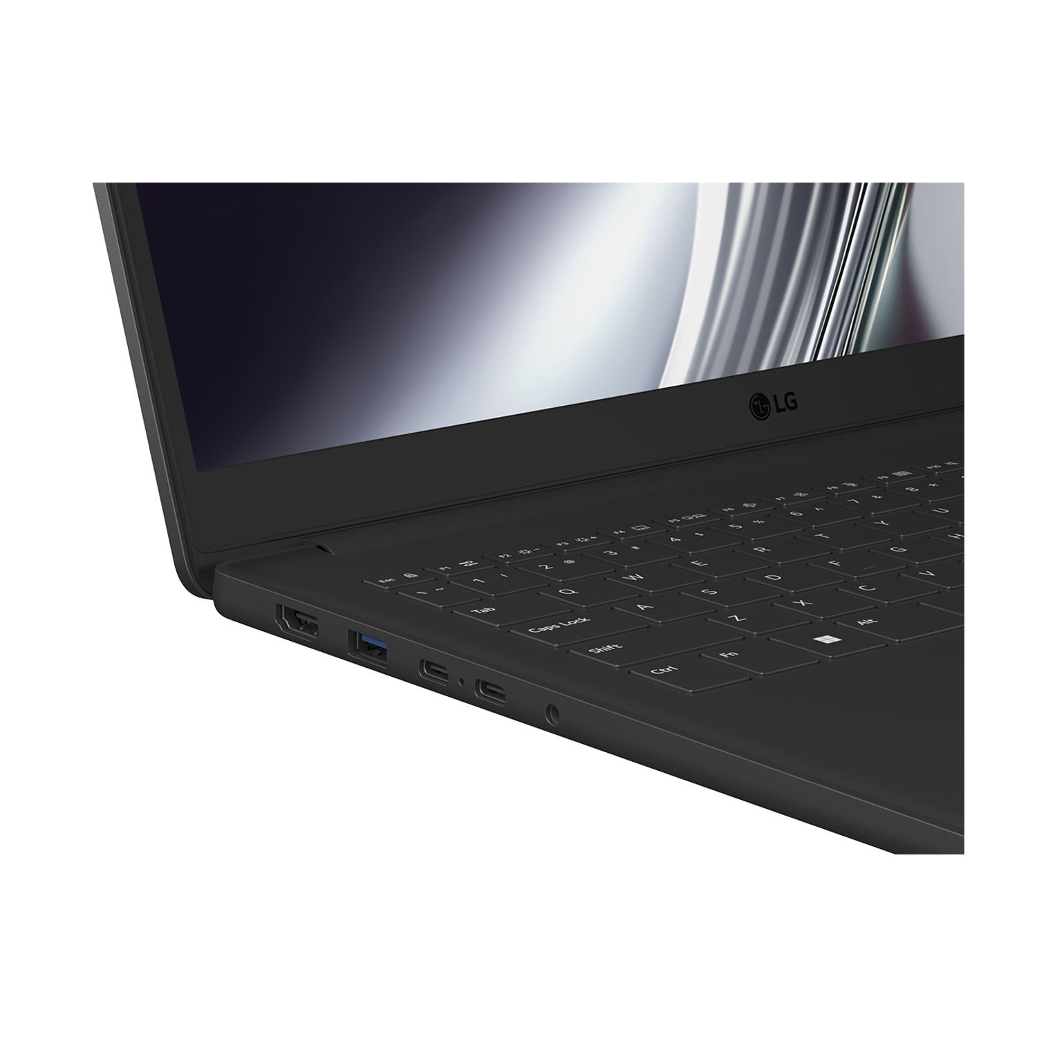 Primo piano di un laptop LG nero, con tastiera e porte visibili.