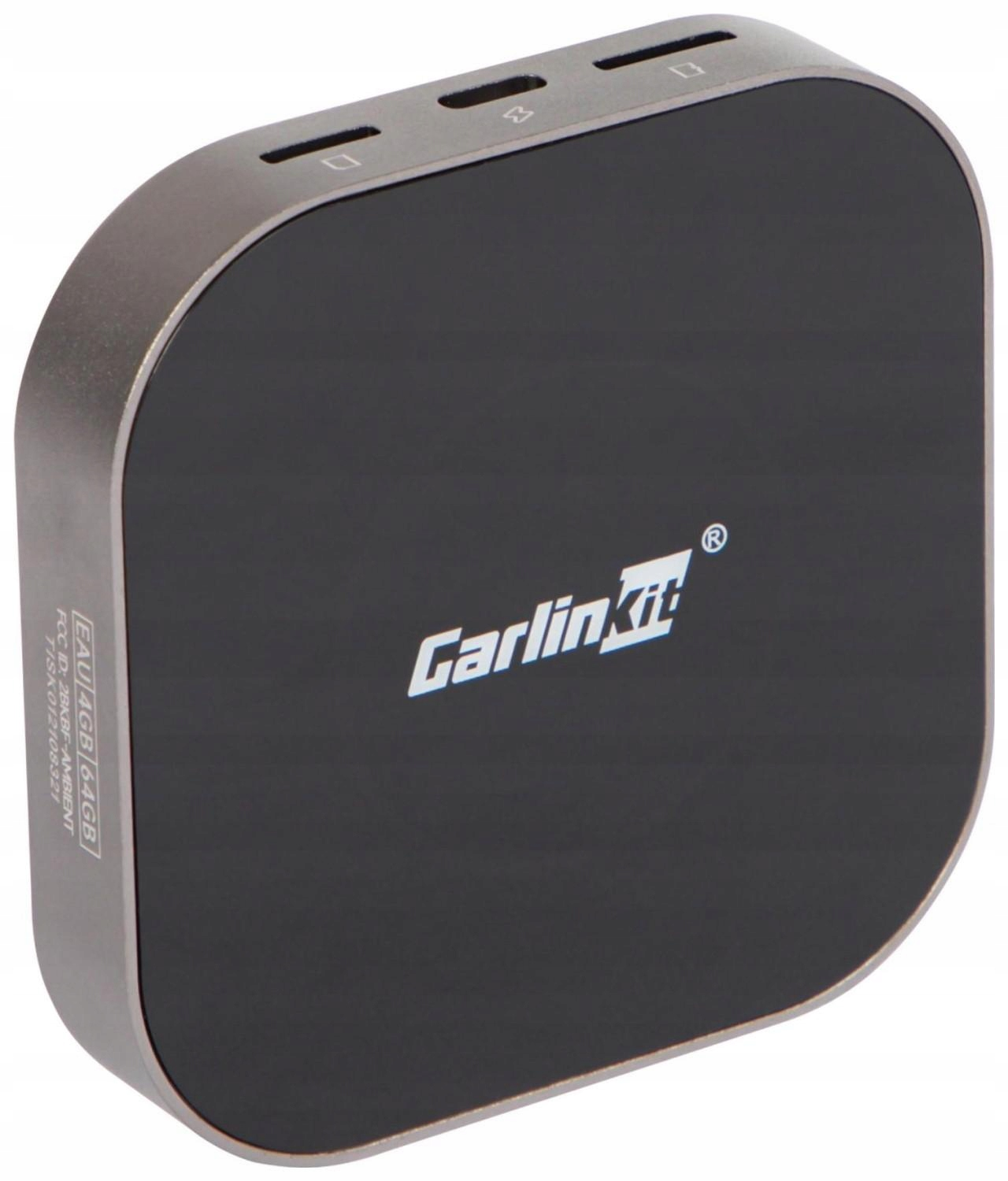 Czarny adapter Carlinkit z gniazdami na górze i logo.