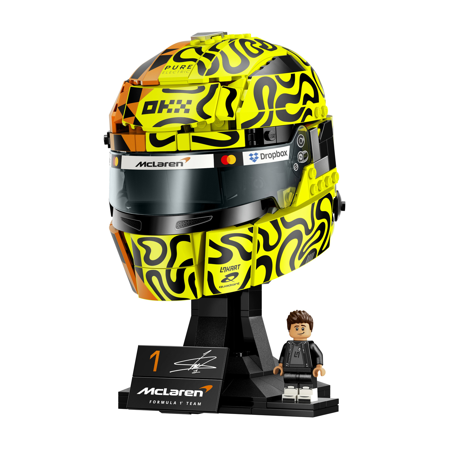 Casco e figura Lego di Formula 1 su supporto nero con logo McLaren.