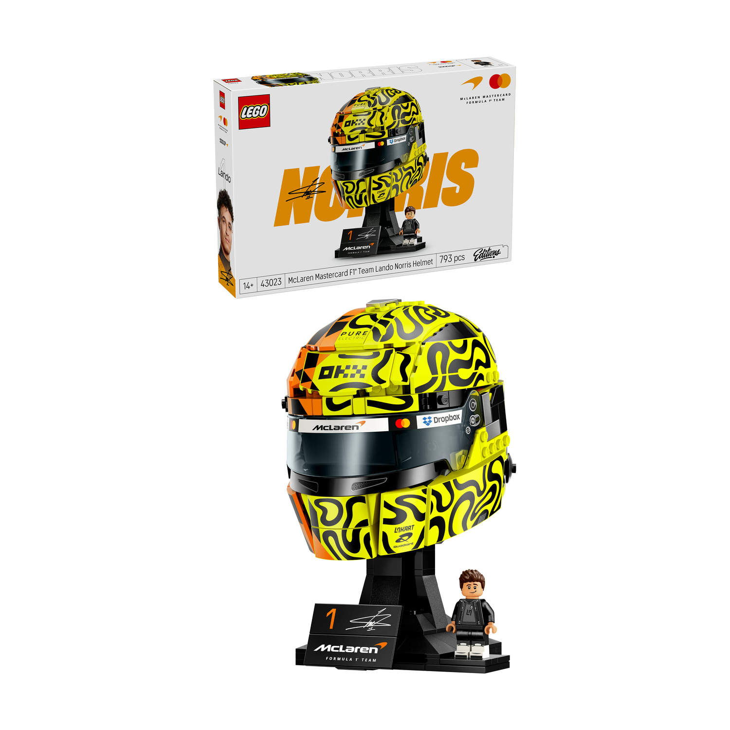 Casco LEGO Lando Norris, giallo con motivi neri, su espositore con minifigure.