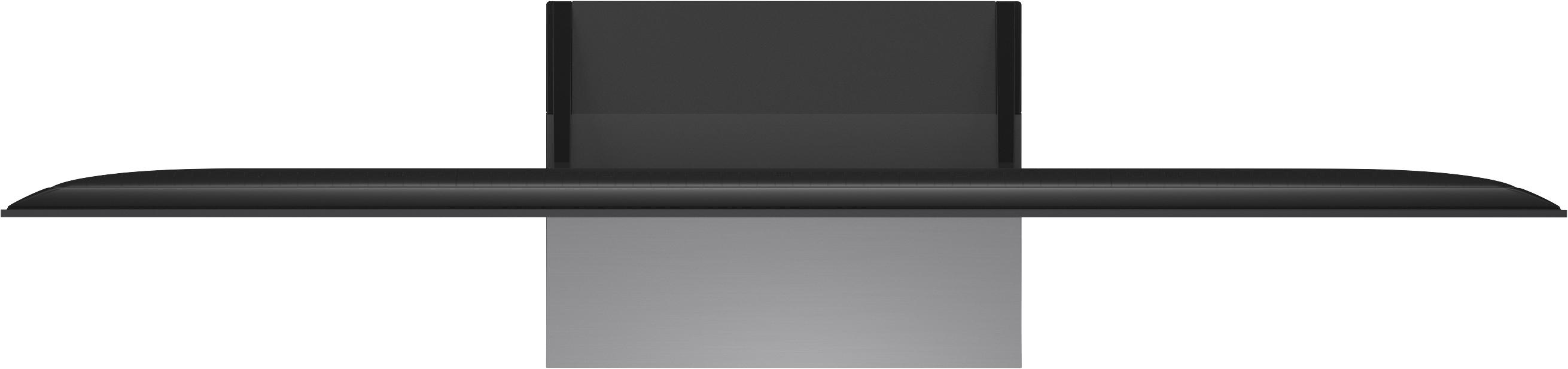 Schwarzer Dunstabzugshaubenaufsatz mit gebogener Metallfront über einem grauen rechteckigen Sockel.