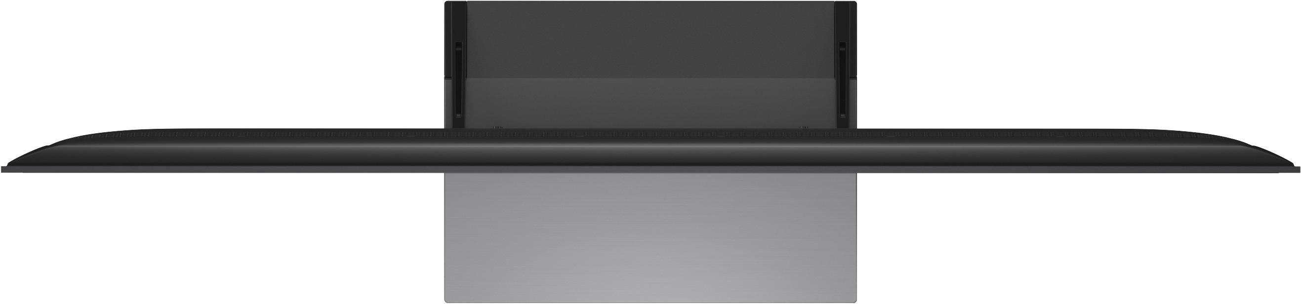Ein flaches, schwarzes Technologiegerät mit einem breiten Bildschirm und einem grauen Sockel.
