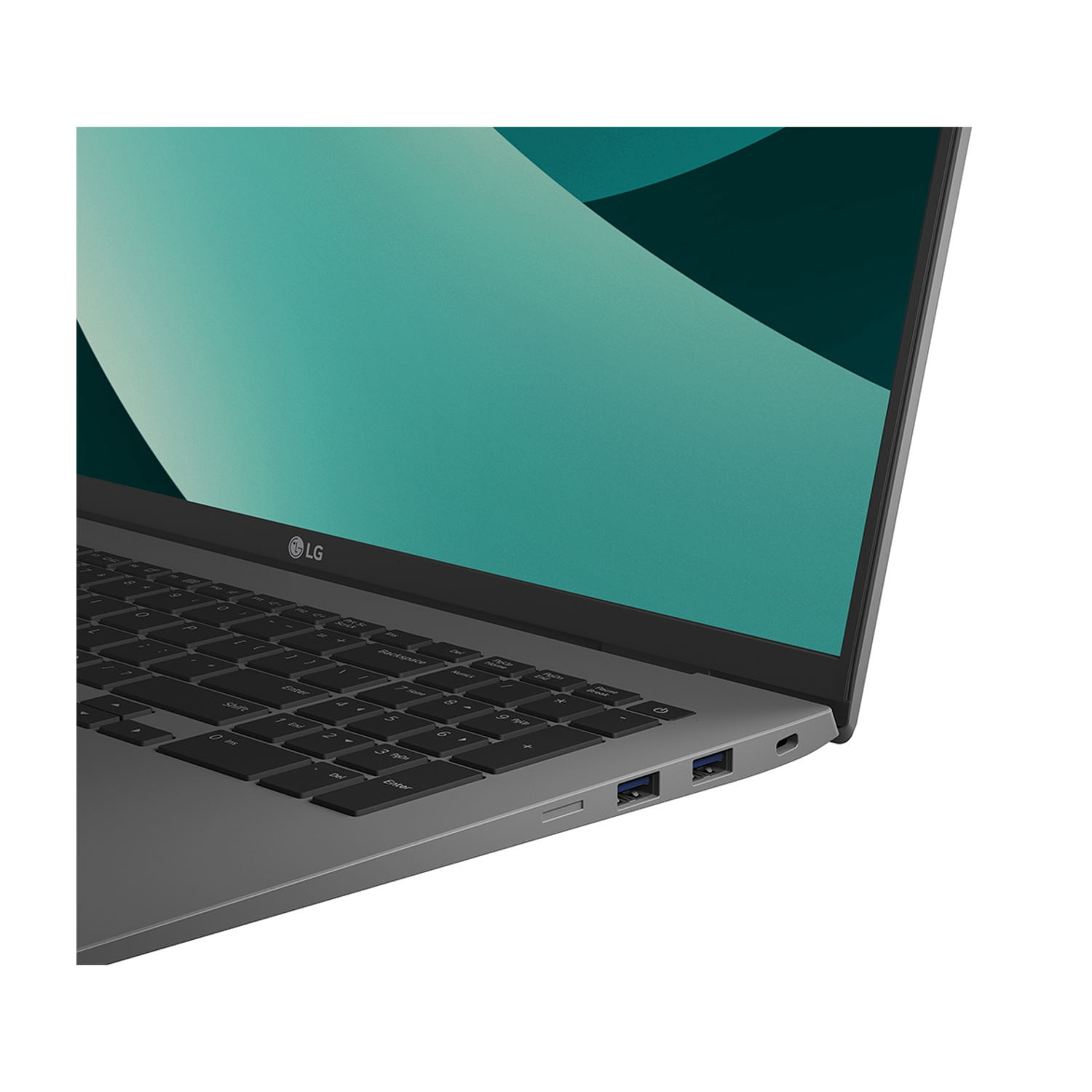 Primo piano di un laptop LG grigio con schermo verde acqua. Visibili due porte USB.