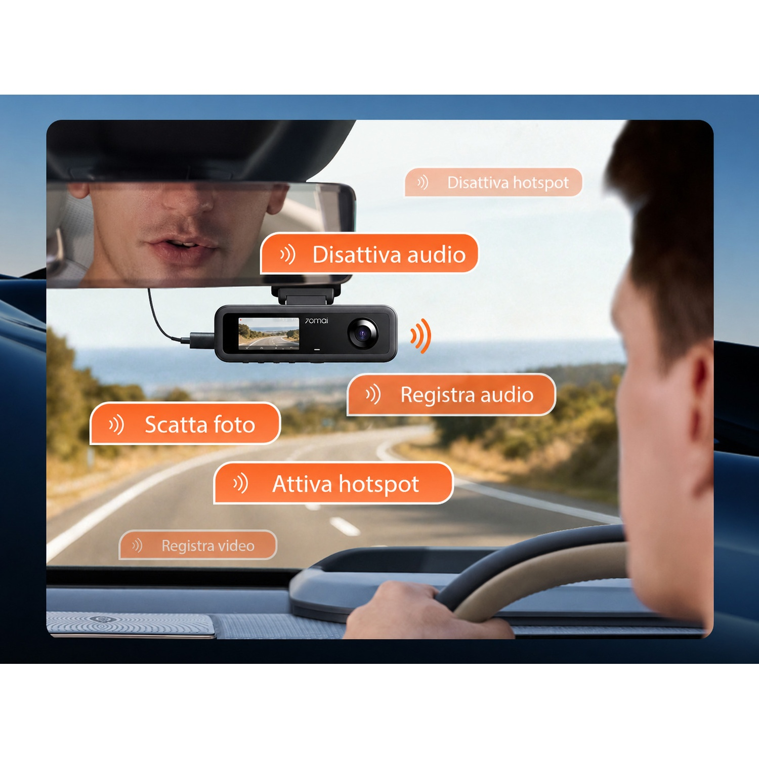 Un uomo guida un'auto, una mano sul volante. Una dashcam è montata.