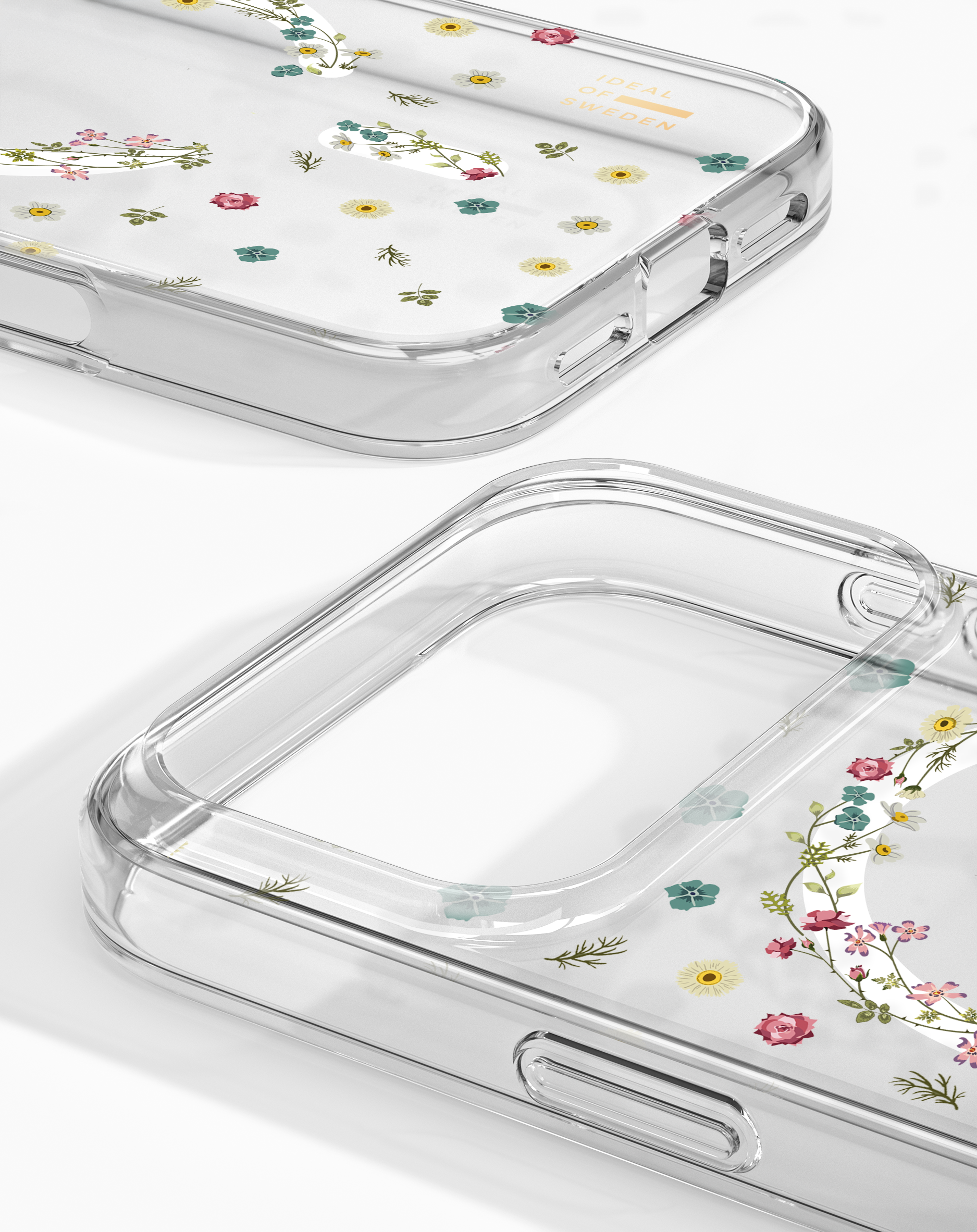 Transparente Handyhülle mit zarten Blumenmotiven und dem Schriftzug 'IDEAL OF SWEDEN'.