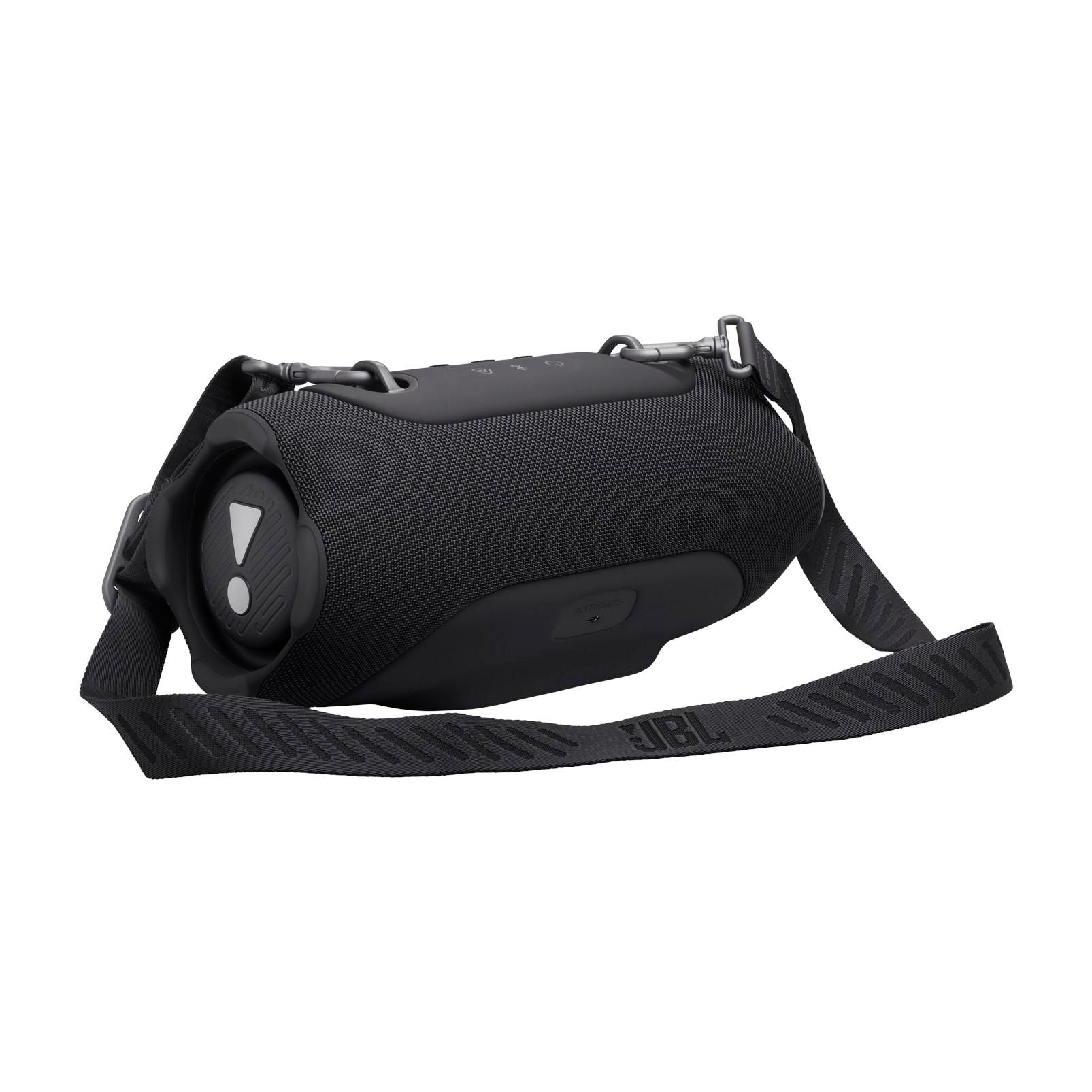 Schwarzer JBL Bluetooth-Lautsprecher mit Tragegurt, auf weißem Hintergrund.