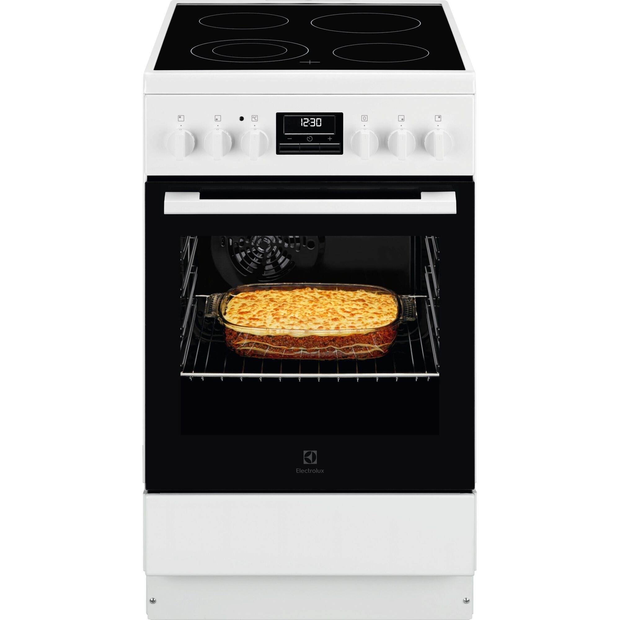 Biała kuchenka elektryczna z płytą grzewczą i otwartym piekarnikiem z lasagne.