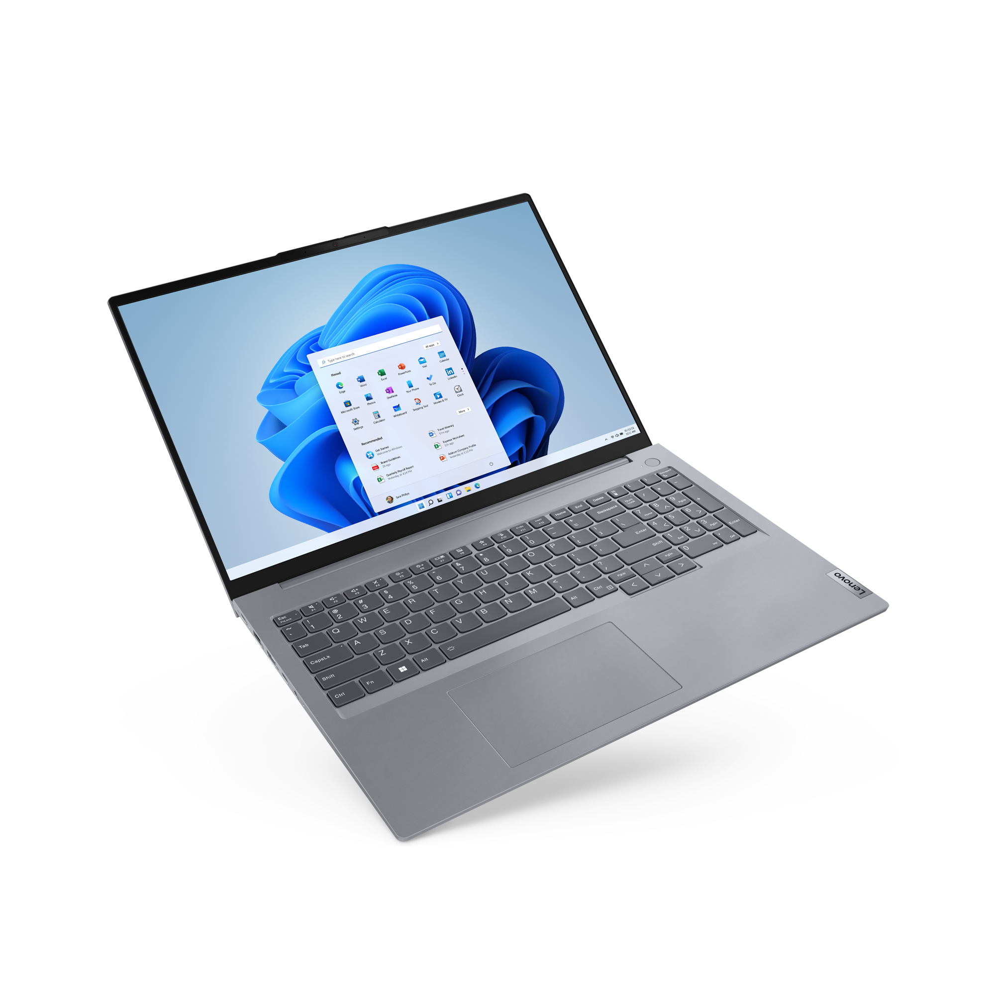 Srebrny laptop wyświetlający menu Start systemu Windows 11.