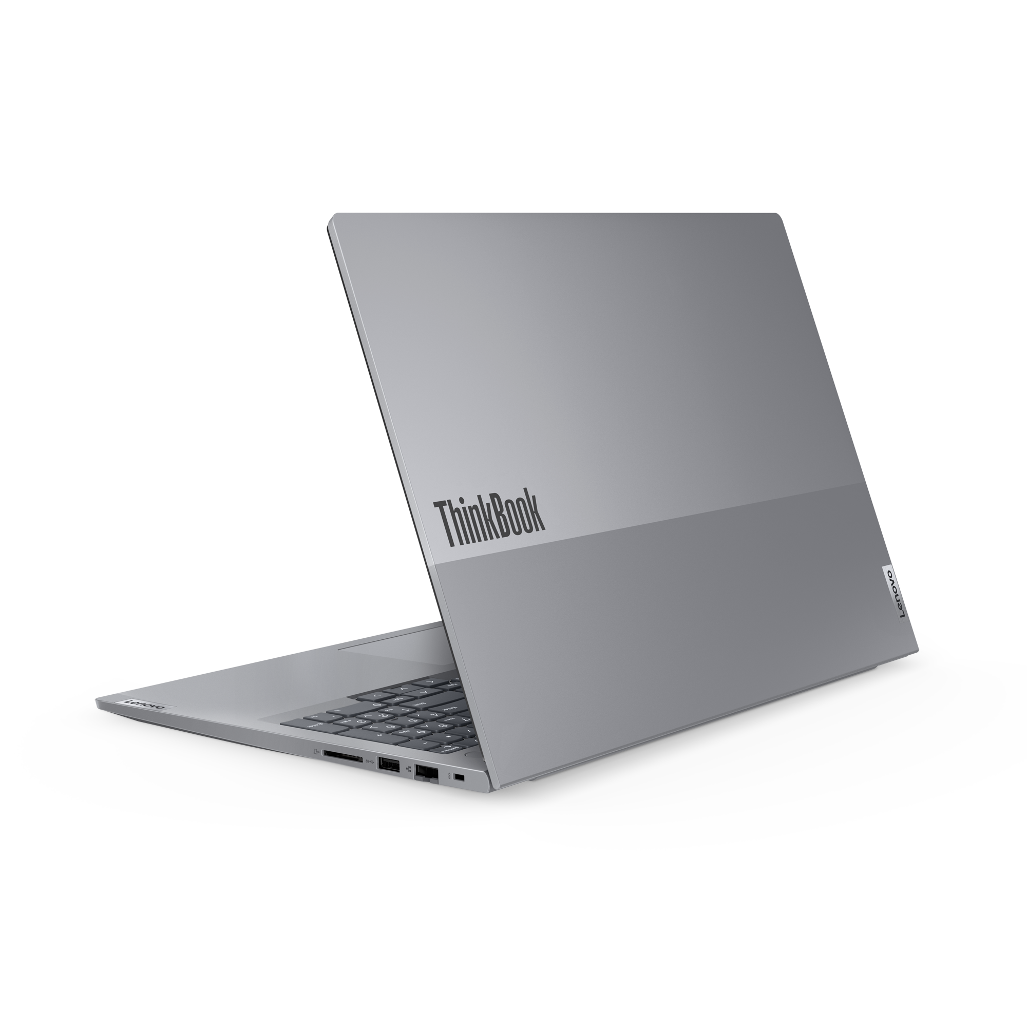 Srebrny laptop Lenovo ThinkBook, częściowo otwarty, z widoczną klawiaturą i portami.