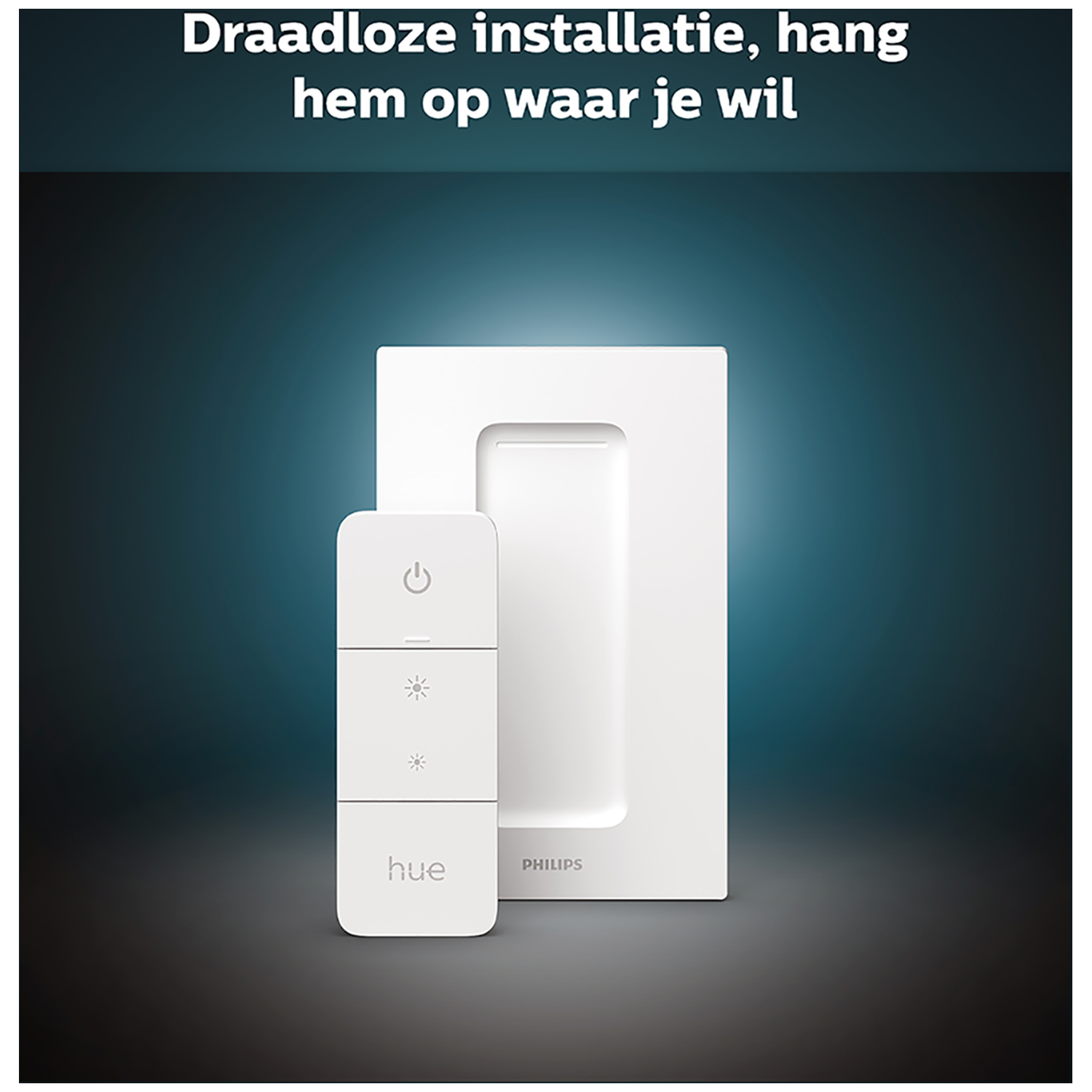 Een witte Philips Hue dimmer schakelaar met afstandsbediening op donkere achtergrond.