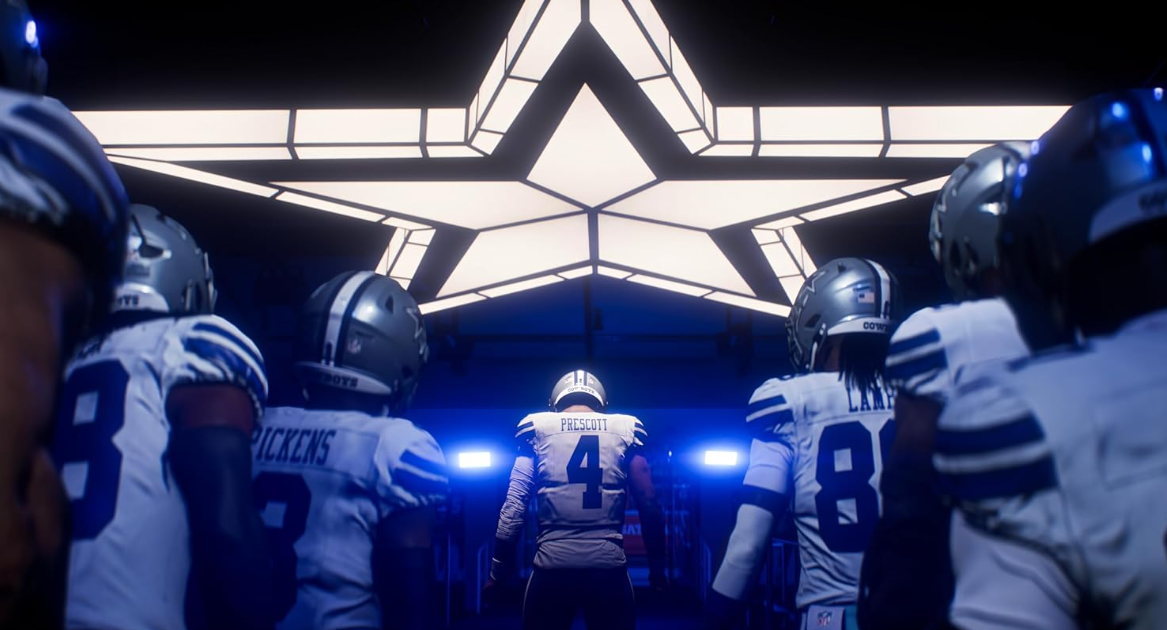 Fußballspieler in Dallas Cowboys Uniformen gehen unter einem Sternentunnel heraus.