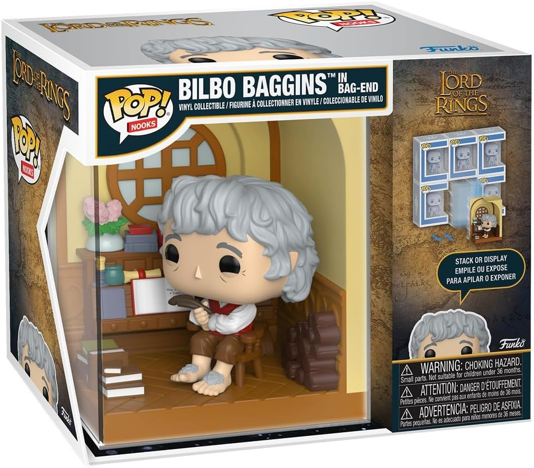 Funko Pop! Vinilo de Bilbo Bolsón en Bolsón. Sentado en silla, sosteniendo herramienta de escritura.