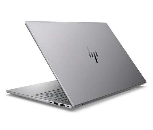 Un portátil plateado con el logo de HP en la tapa y teclado visible.