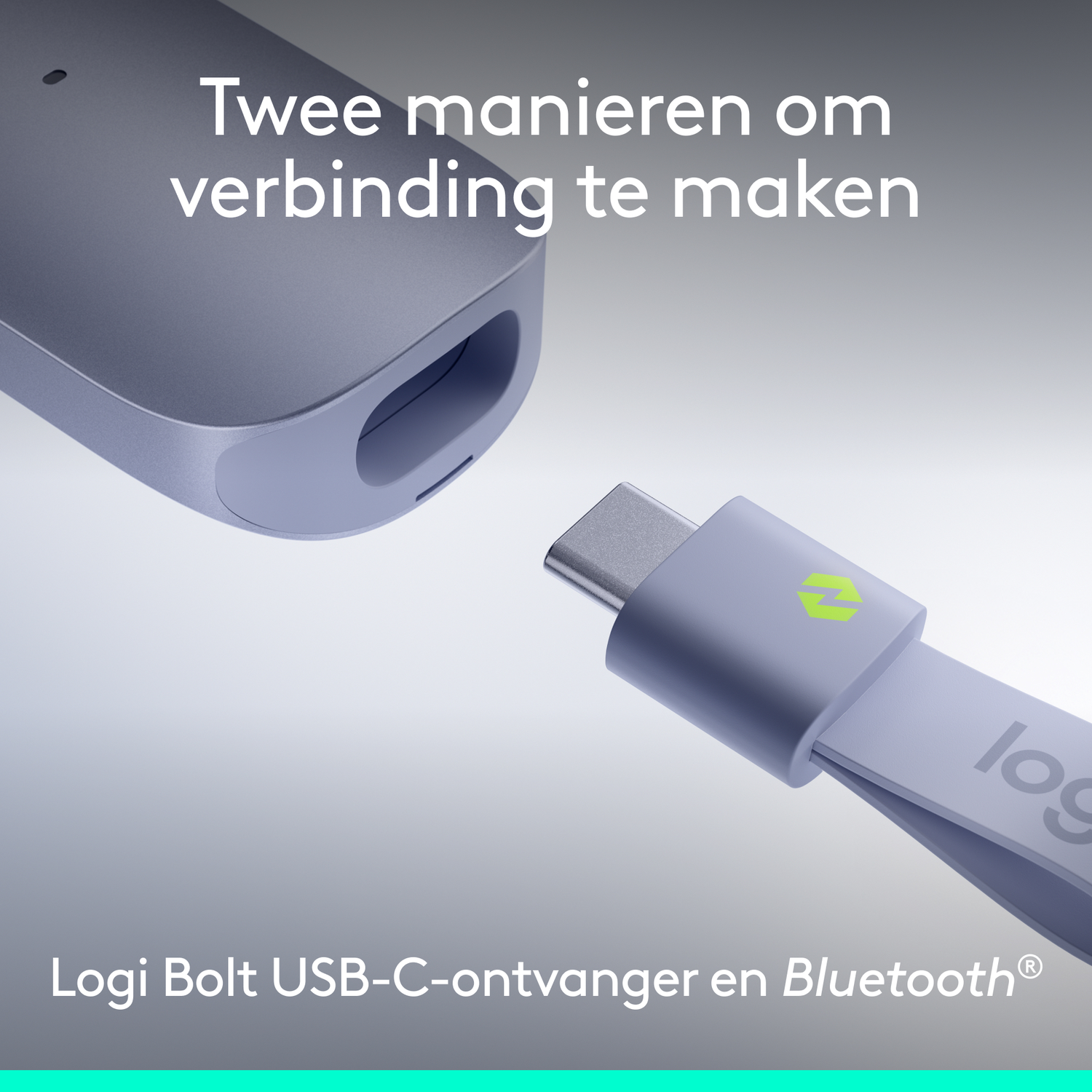 Een grijze USB-C ontvanger en kabel met Logitech logo, close-up.