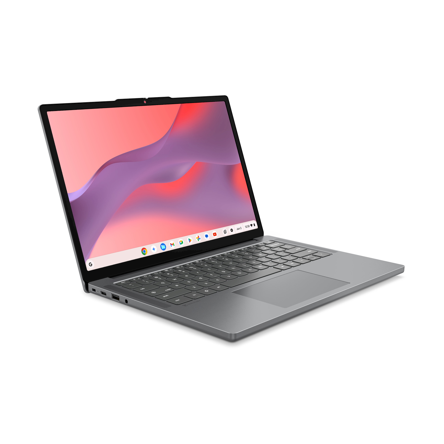 Laptop grigio con schermo aperto, che mostra uno sfondo viola e rosso.