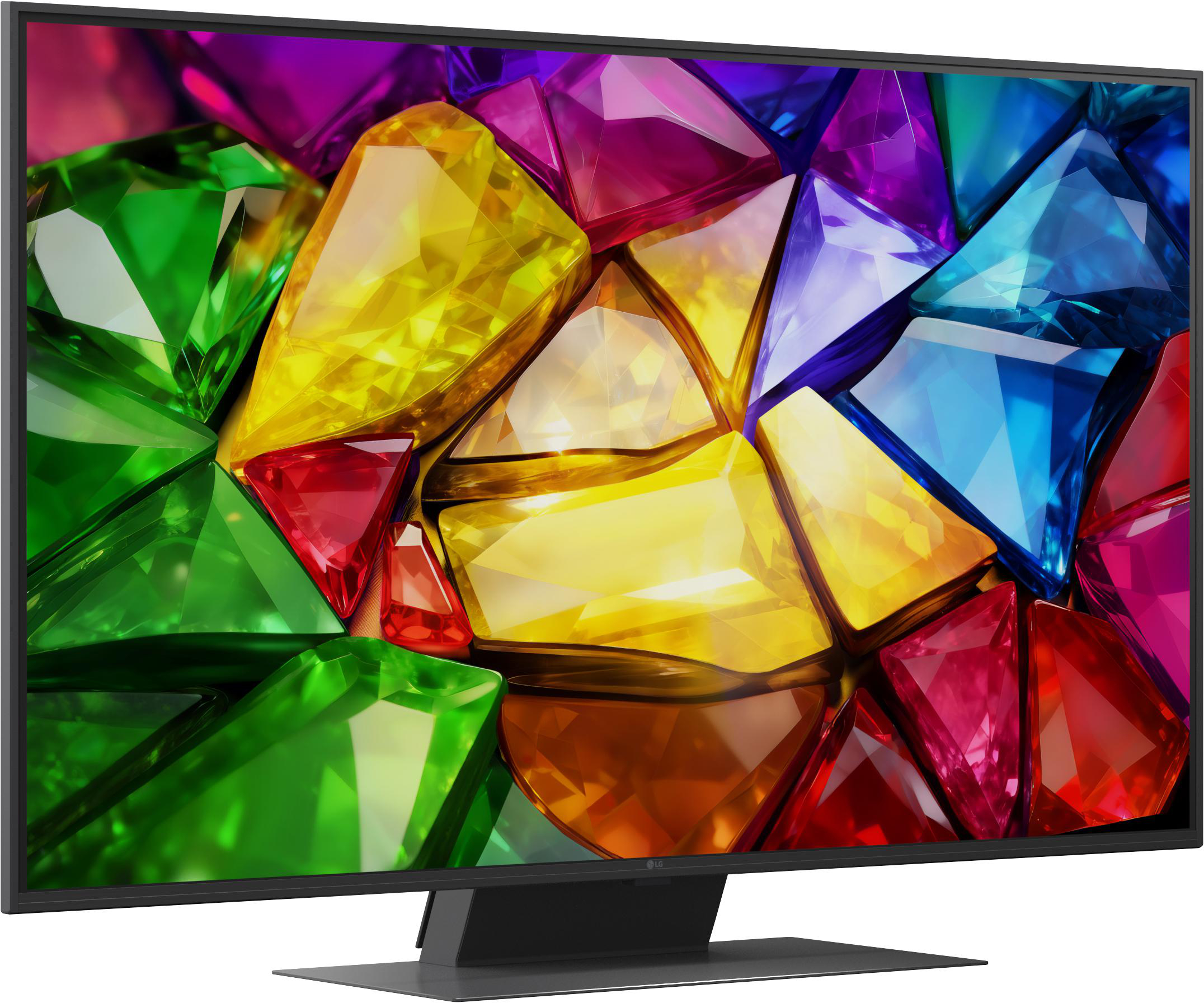 Ein Fernseher zeigt ein Kaleidoskop aus bunten, facettierten Edelsteinen.