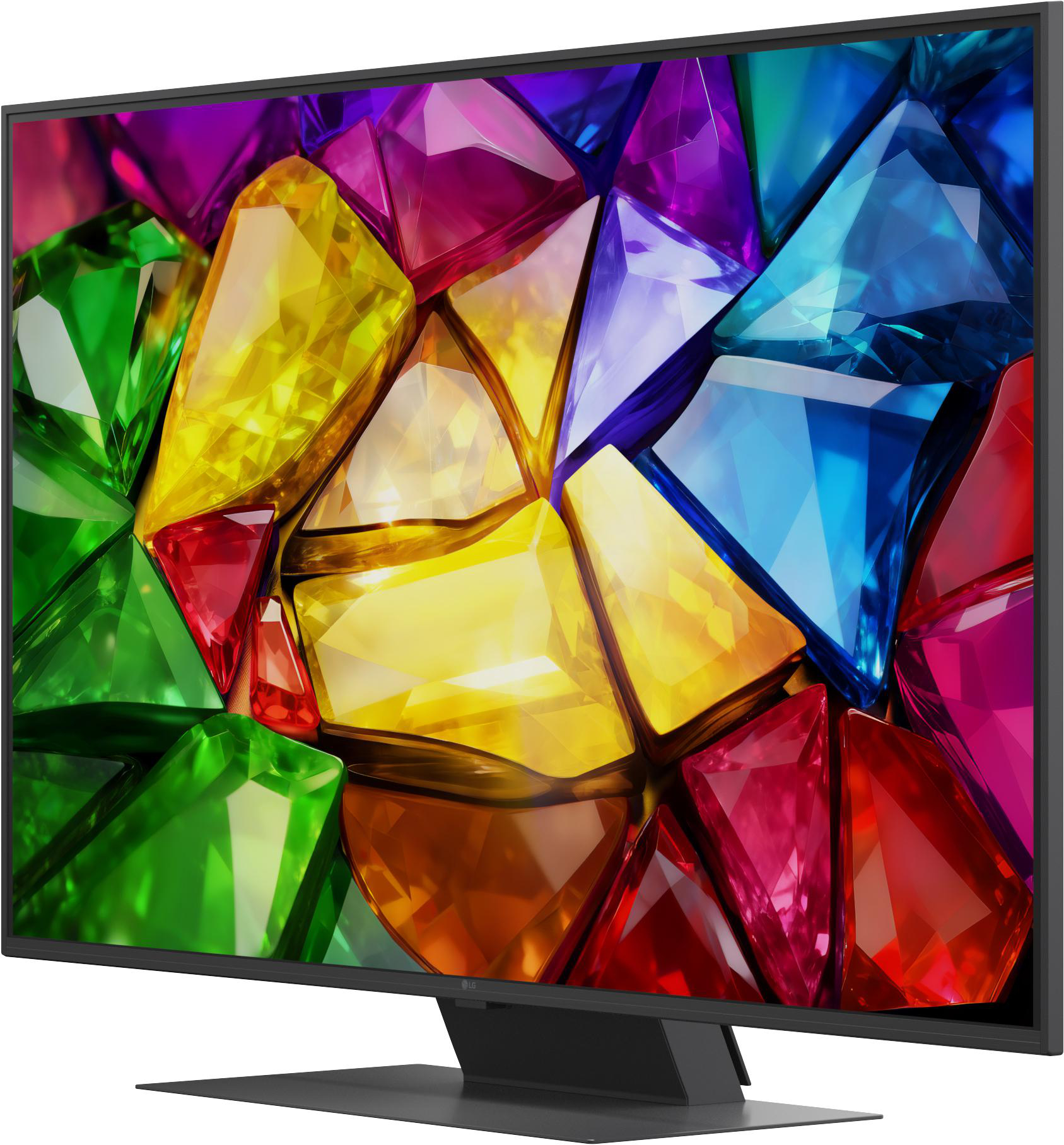Ein Monitor zeigt ein abstraktes Muster aus bunten, facettierten Edelsteinen.