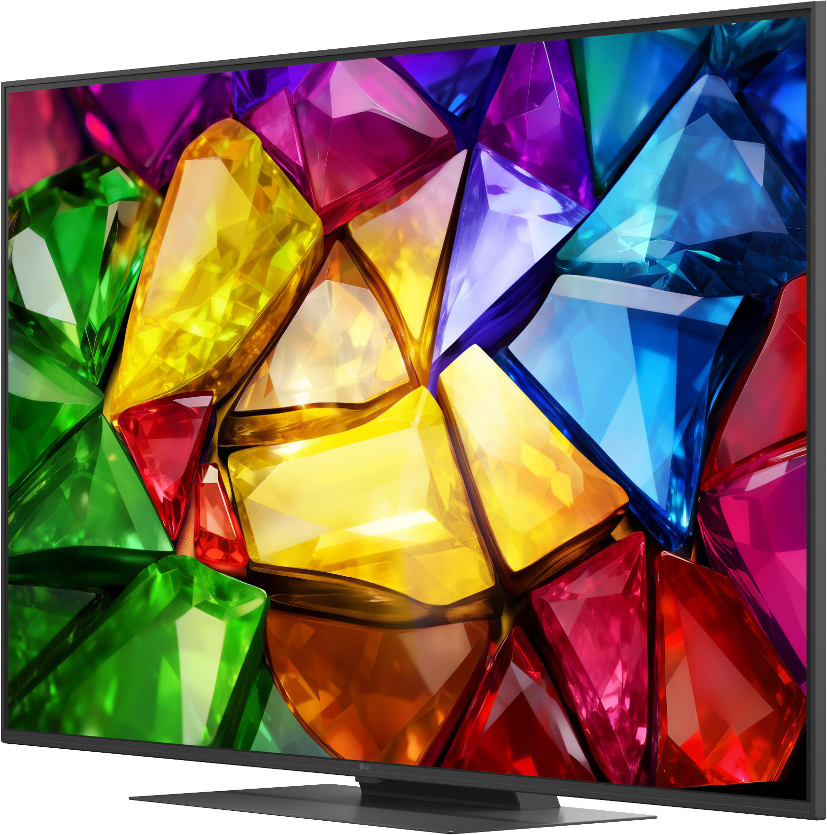Ein moderner Fernseher zeigt ein lebendiges Bild von geschliffenen Edelsteinen in Rot, Gelb, Grün und Blau.