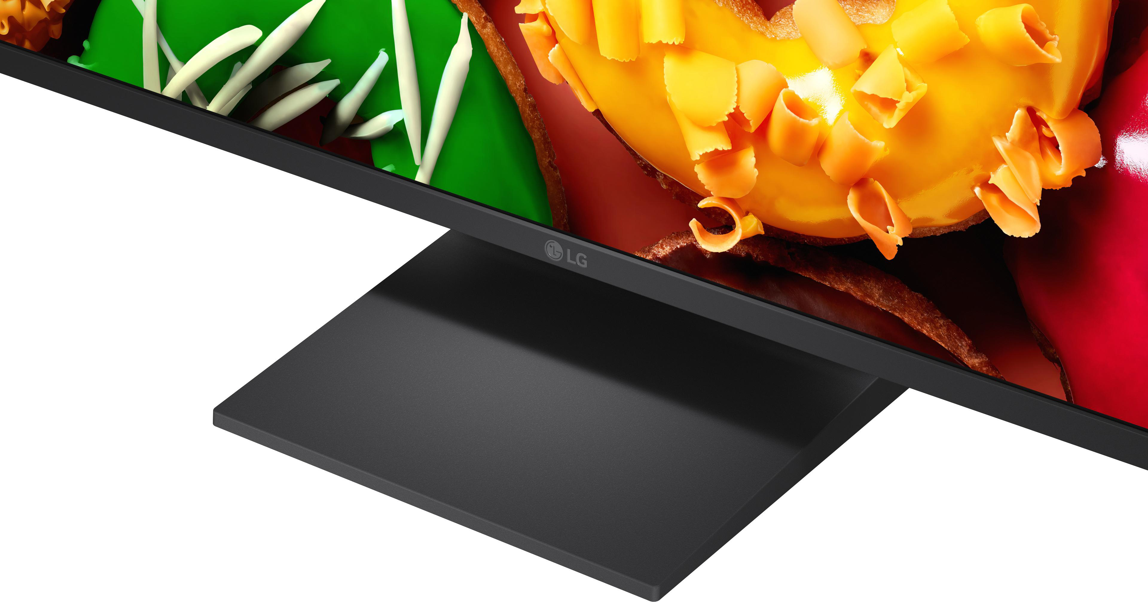Ein Monitorständer mit dem LG-Logo und einem bunten Bild auf dem Bildschirm.