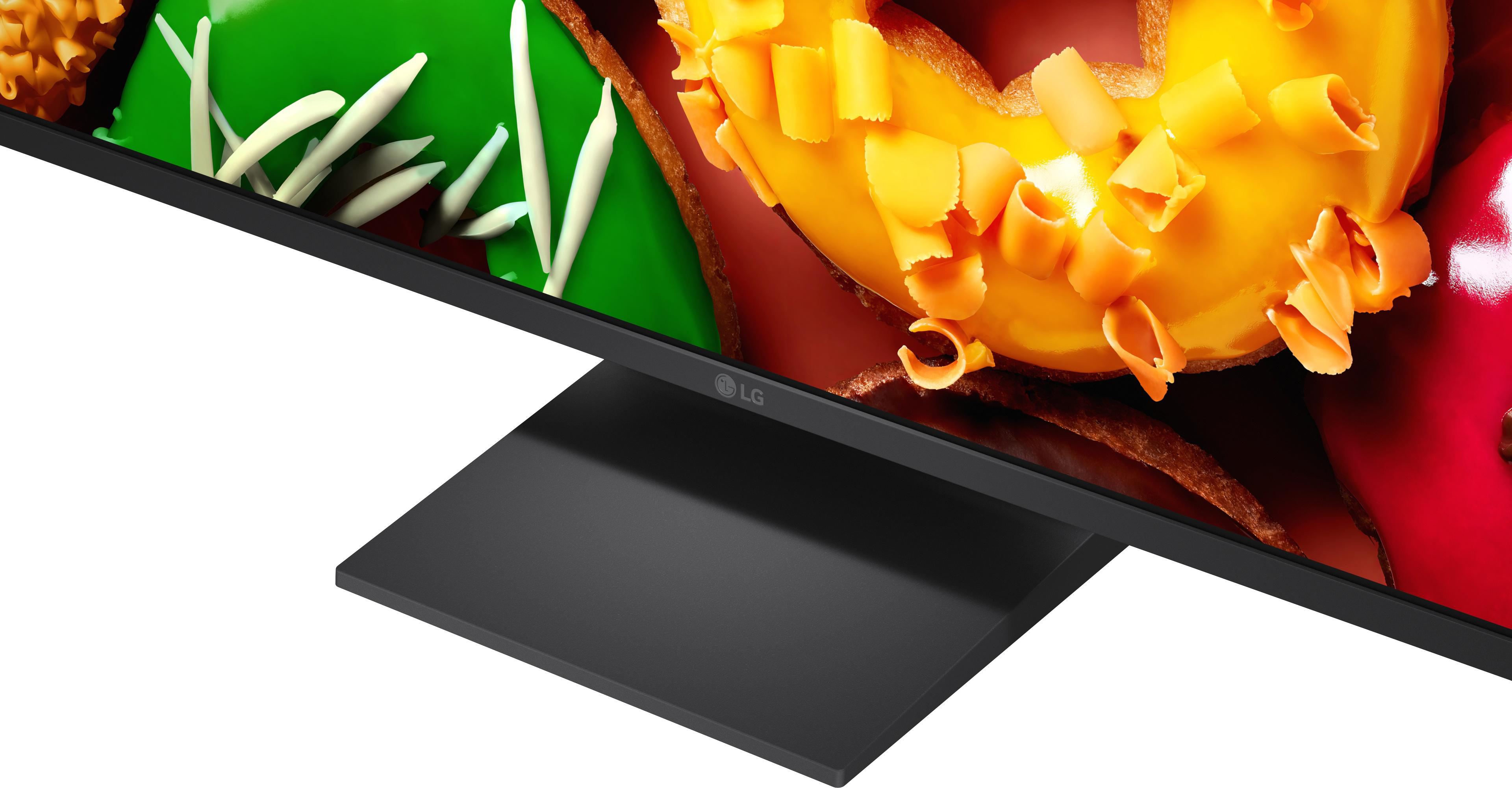 Ein Monitor zeigt ein Bild von gelben und grünen Desserts mit weißem Topping.