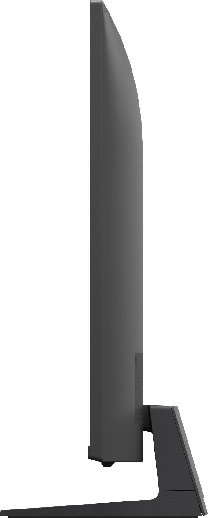 Ein schwarzer Computermonitor von der Seite auf weißem Hintergrund.