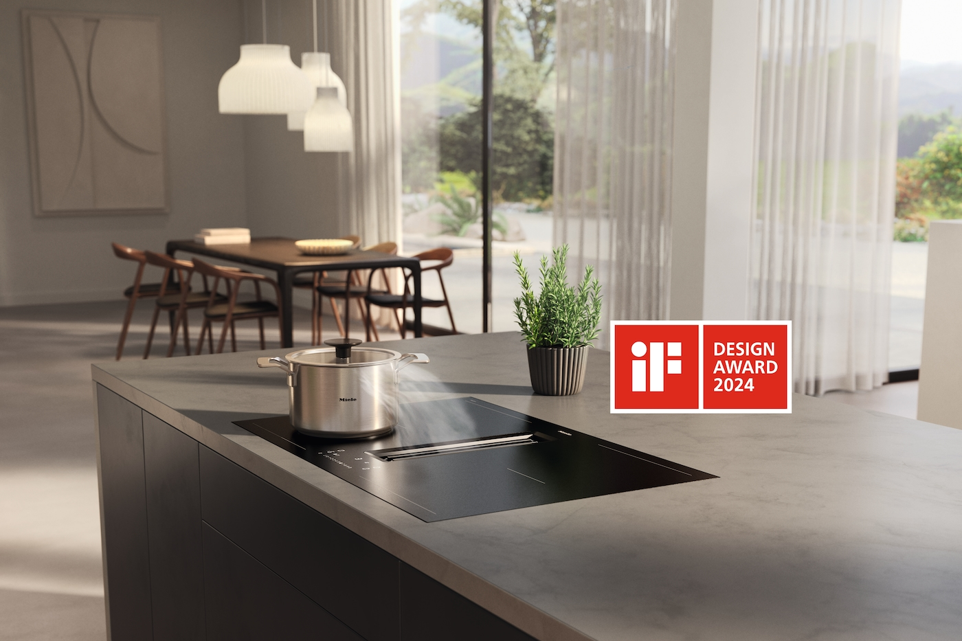 Moderne Kücheninsel mit Induktionskochfeld, Topf, Pflanze und IF Design Award 2024 Logo.