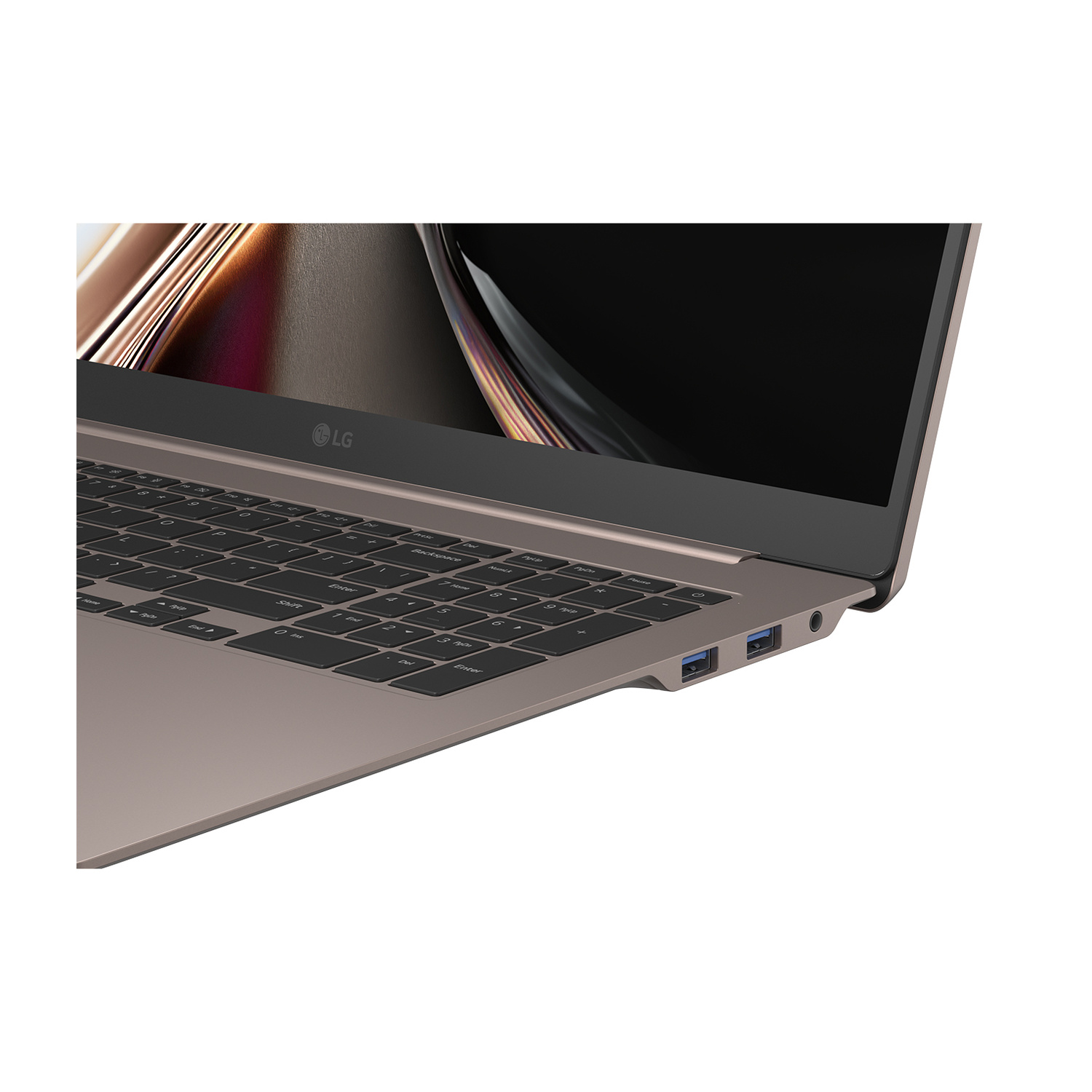 Un laptop LG color bronzo con tastiera nera e due porte USB.