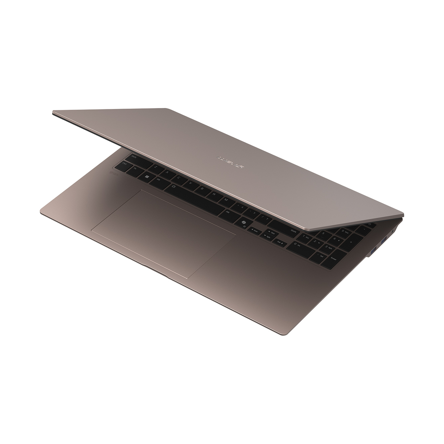 Un laptop aperto, color bronzo, con tastiera e touchpad.