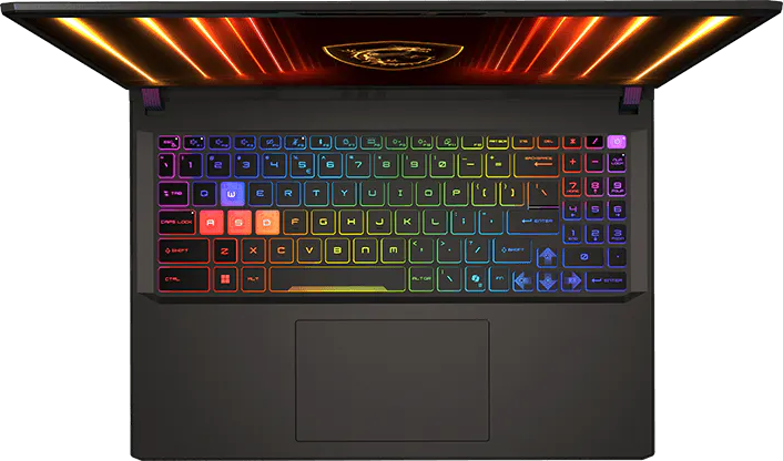 Nyitott laptop szivárványos háttérvilágítású billentyűzettel és logóval.
