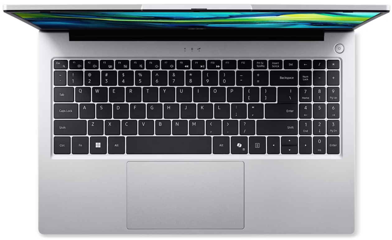 Ezüst laptop felülnézetből, nyitott képernyővel, színes jelenetet mutatva.