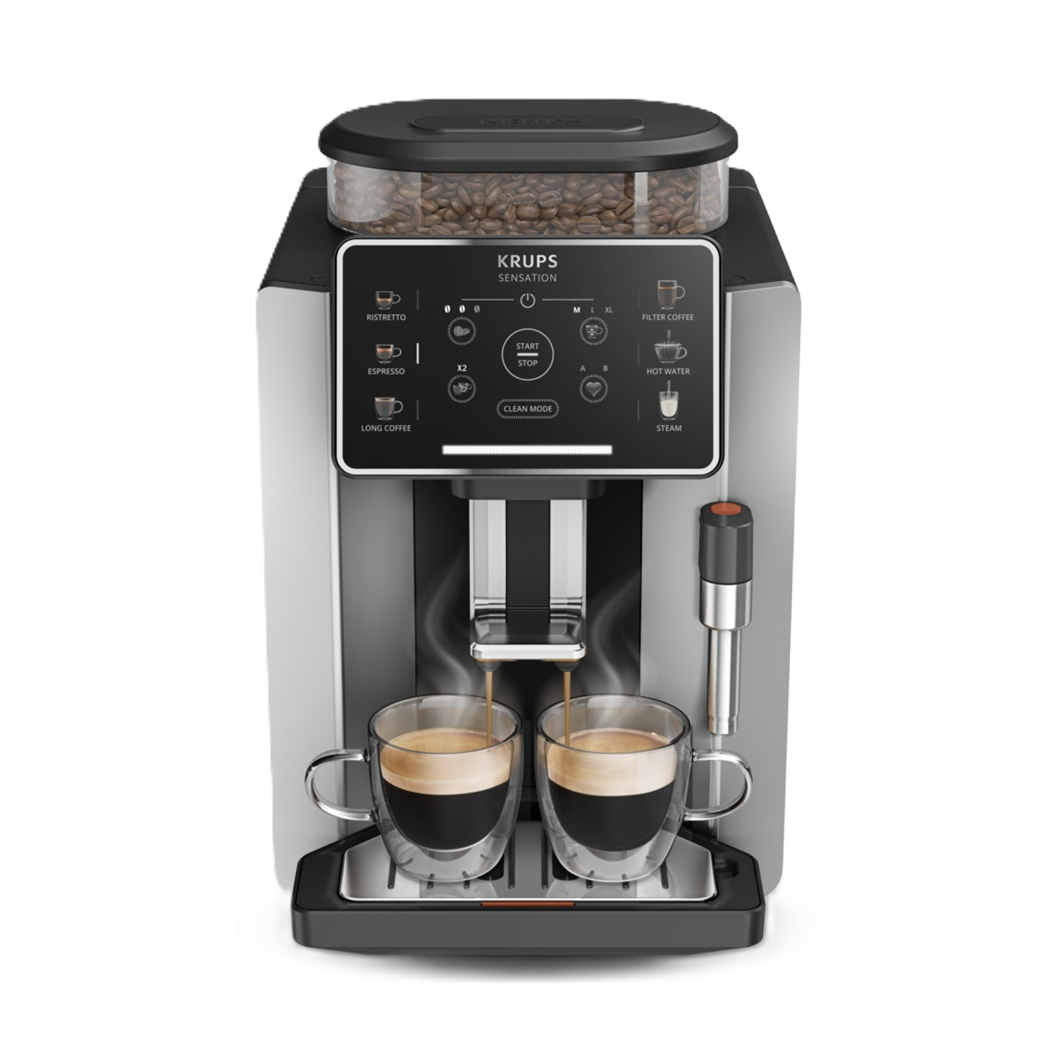 Una macchina da caffè Krups Sensation prepara due caffè in tazze di vetro, con chicchi in cima.
