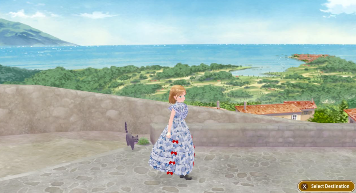 Ein Mädchen im blauen Kleid mit Schleifen steht auf einem gepflasterten Weg mit Blick auf das Meer.
